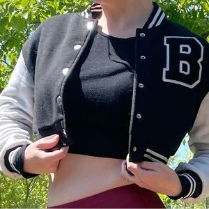 Varsity jacket with letter on it
